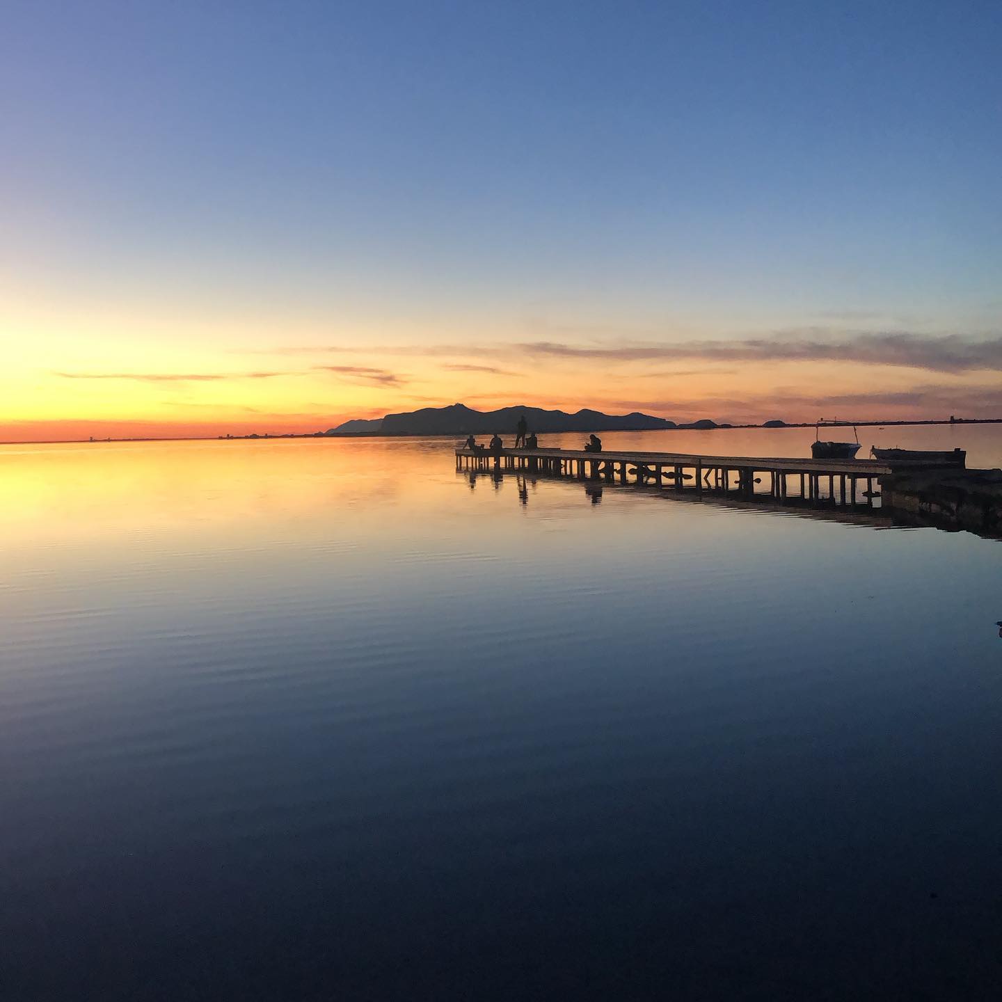 Pontile al tramonto sullo Stagnone di Marsala