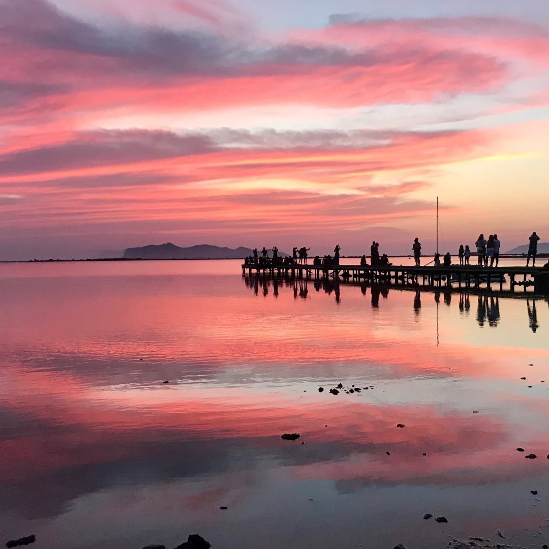 Cielo rosa riflesso sulla laguna